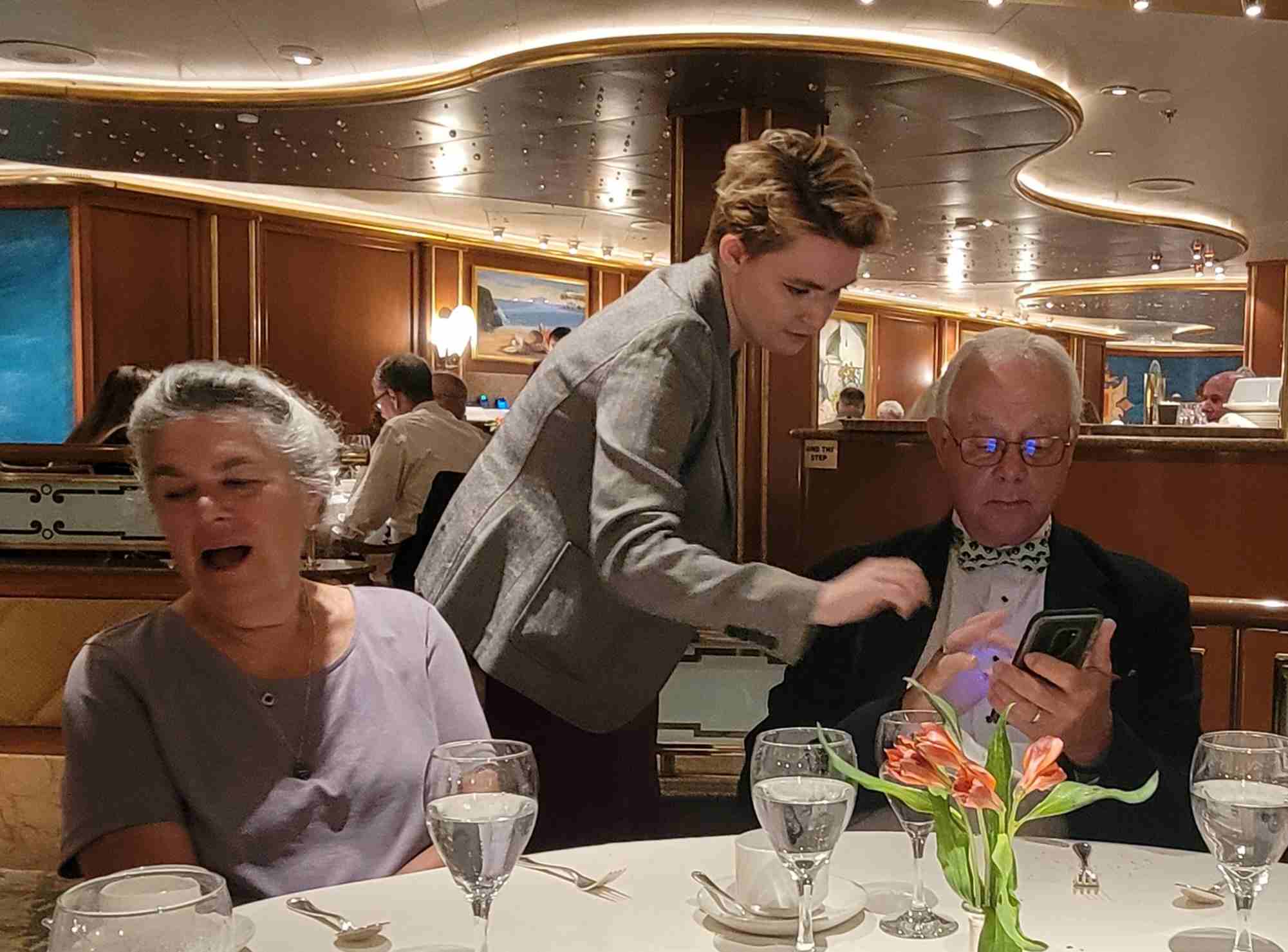2022-05-19 Dinner Cate helping Alvan.jpg